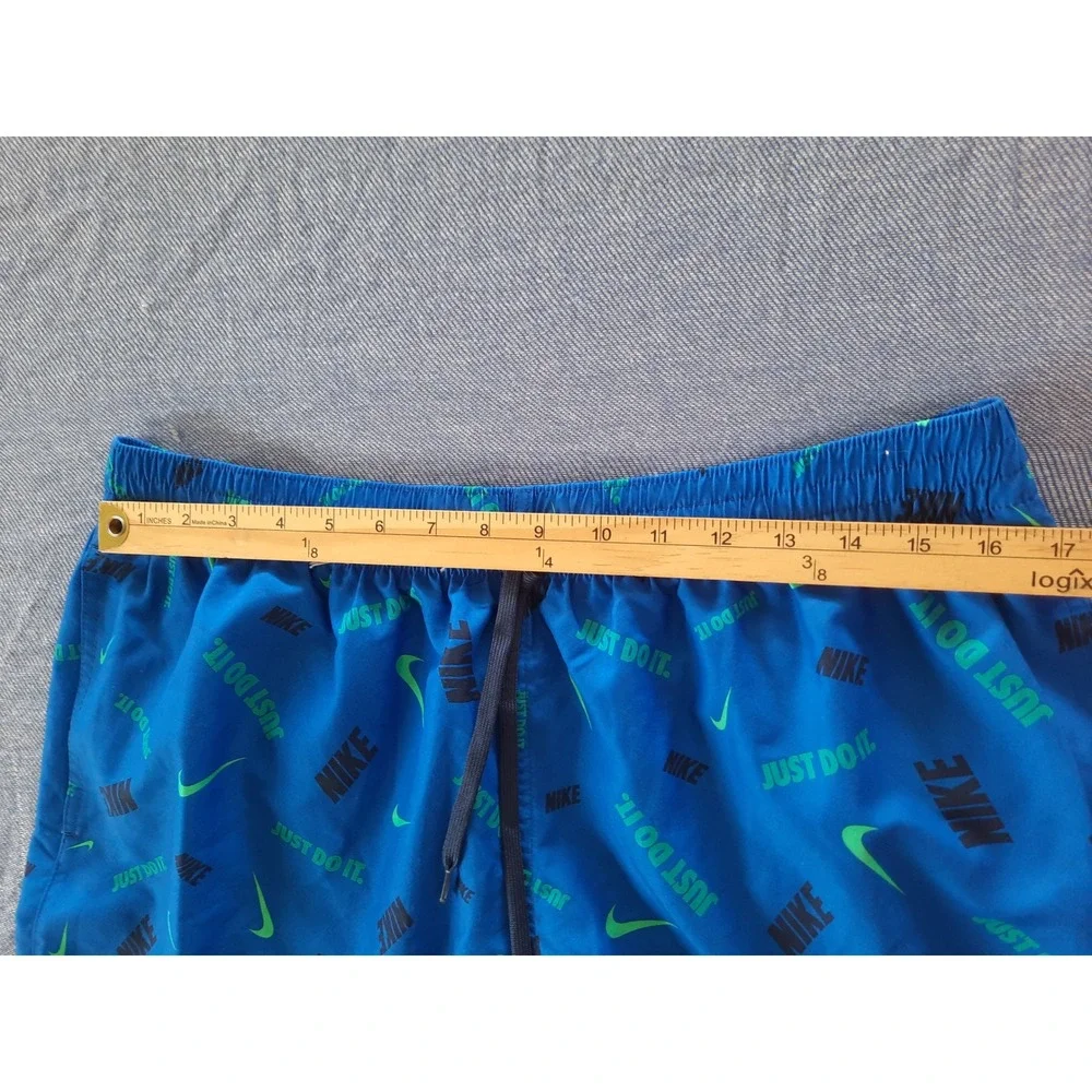 Nike Mens XL Blue Just Do It Swoosh All Over Print Swim Trunks Shorts NESSA474